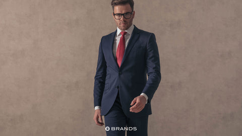 A navy blue suit is a classic staple that can take you from formal occasions to semi-formal events. Its versatility allows you to create various looks by pairing it with different shirts and accessories.