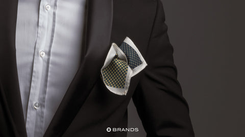 A pocket square is an easy way to add a little flair to your look and make a statement. Add a pocket square which isn’t too flashy, and which goes well with your tie and shirt. 