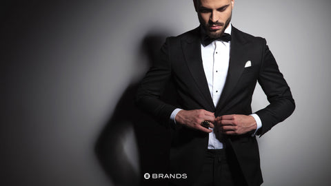 A classic tuxedo or a sharp tailored suit is a timeless look that is perfect for any formal occasion. Opt for a single-breasted jacket with a slim fit and choose classic colors like black. Add a pocket square to add a dash of color and personality. 