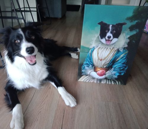 A dog sitting next to his custom dog portrait