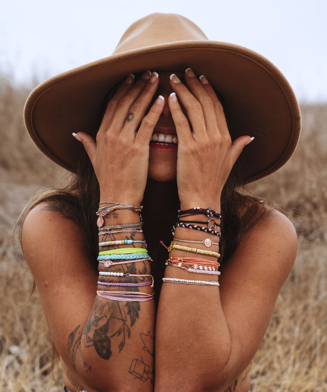 Female customer wearing Pura Vida Bracelets