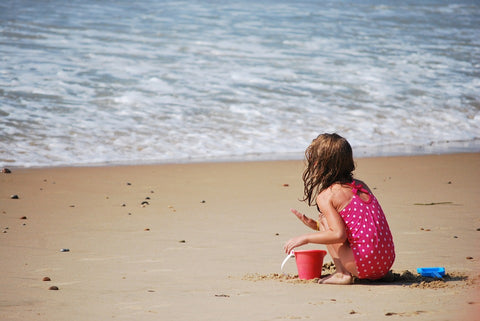 Girl playing in sand