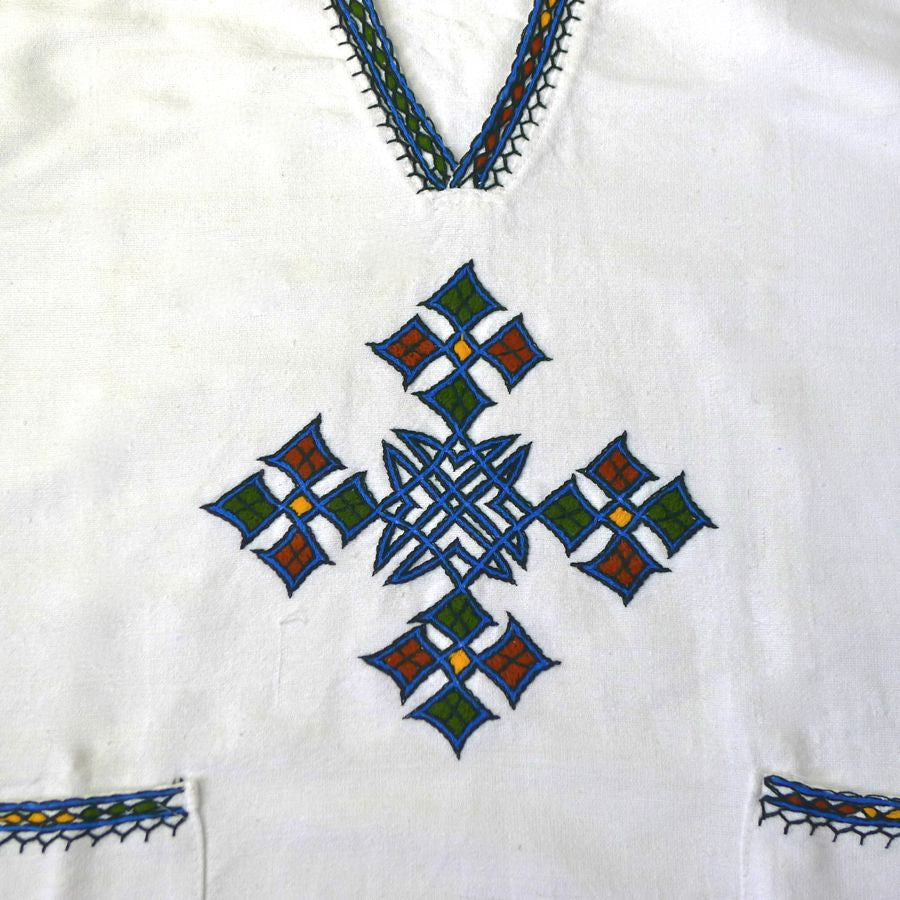 White traditional Ethiopian tunic with multicolored cross embroidered ...