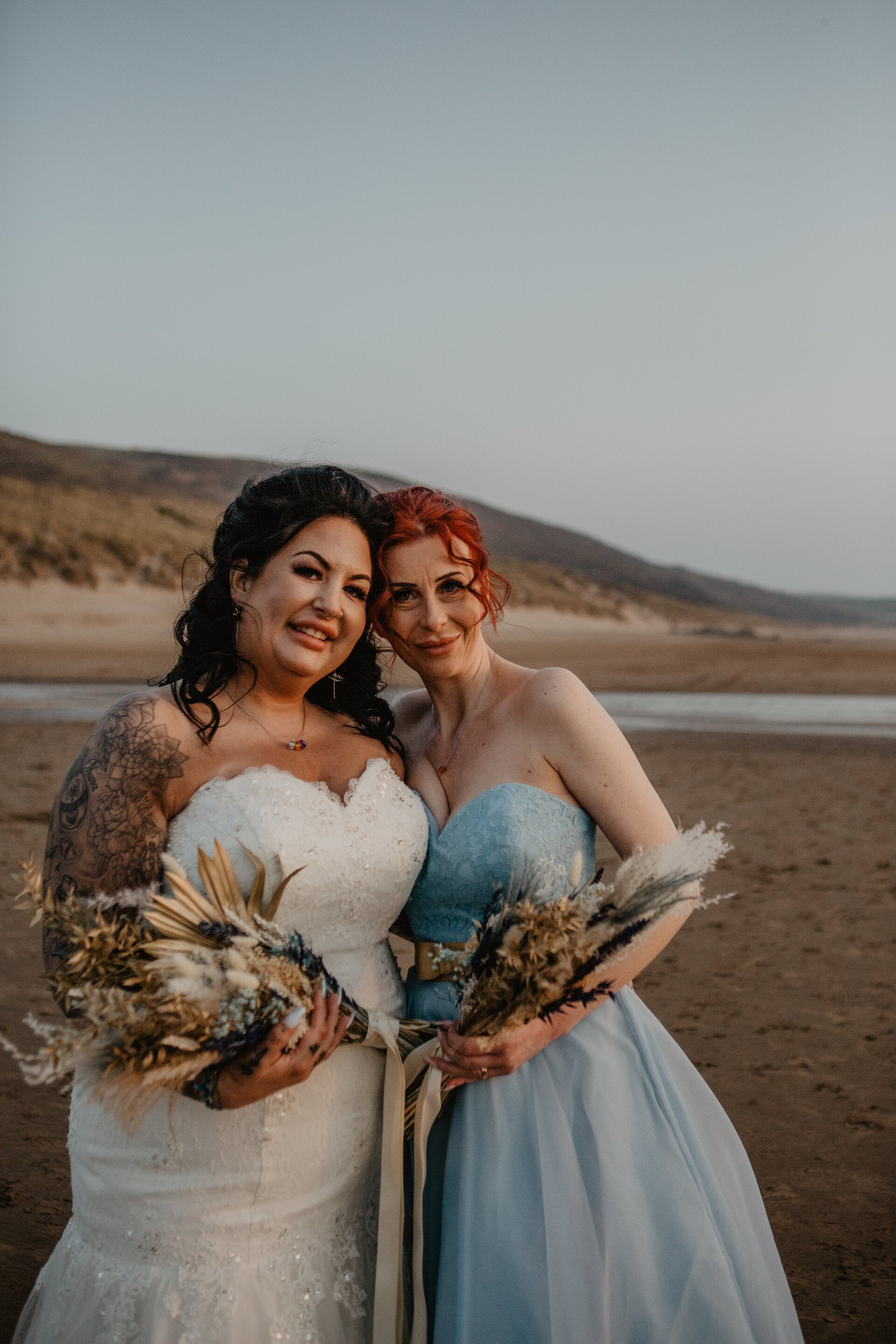 Bridesmaid and Bride on Woolacombe beach wearing Nalu Beads' wedding jewellery