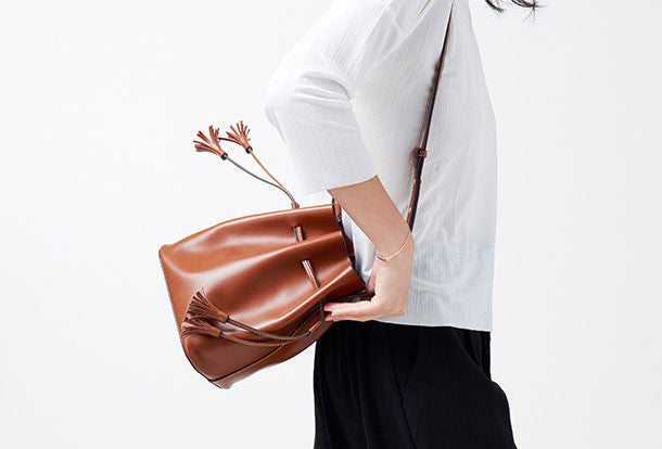 crossbody bucket bag