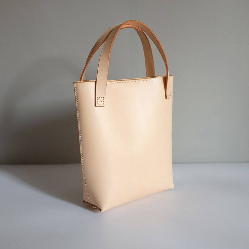 beige tote purse