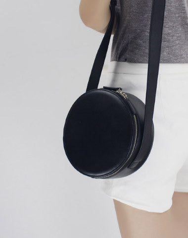 round black leather crossbody bag