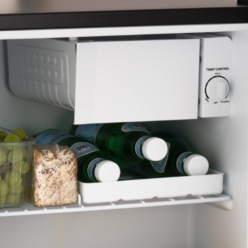 White mini fridge with ice box