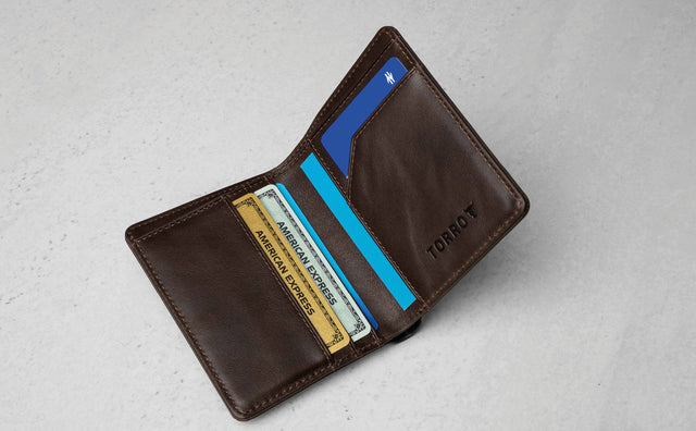 Dark Brown Leather BiFold Wallet holding 5 cards