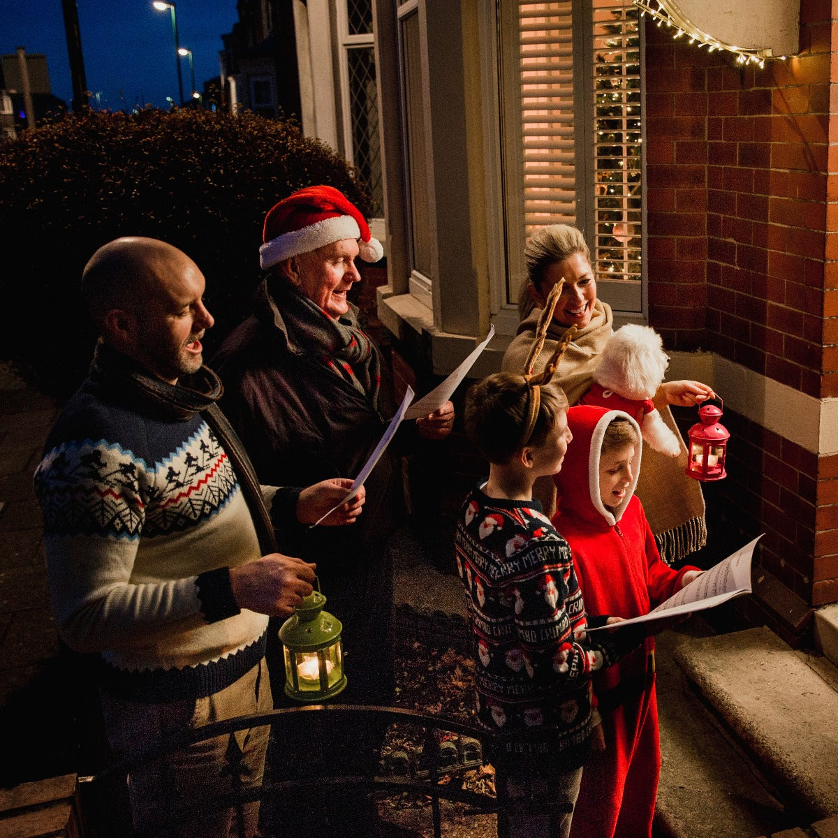 Family singing Christmas carols