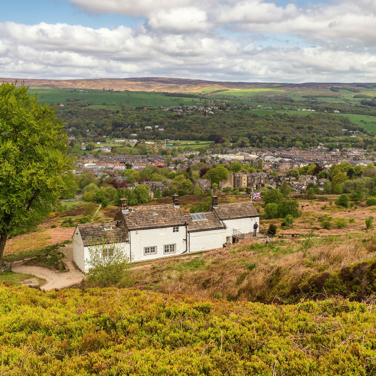 The White Wells Spa building with Ilkley in the background