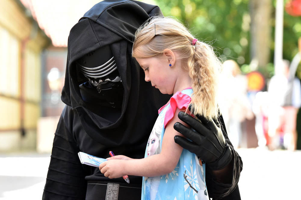 TT Strange Times - A Staycation Summer - Have a marathon Star Wars movie day. Kylo Ren, though hellbent on galactic destruction, still has time for a quick chat and to check out this little girl's notes. Maybe they are detailed plans for a next generation Death Star?