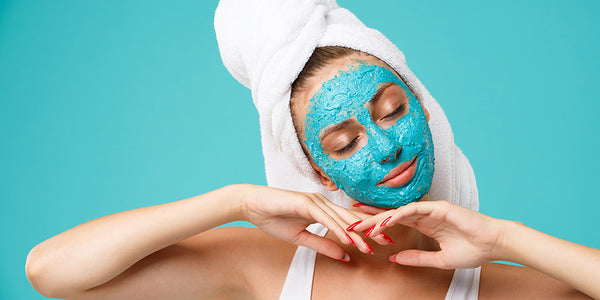 woman with face scrub 