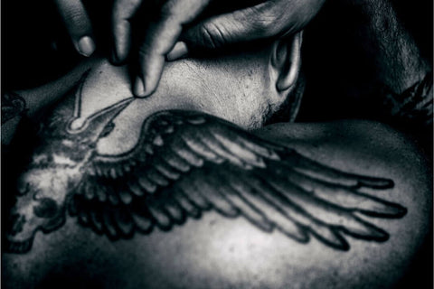 Tatuagem caveira asas