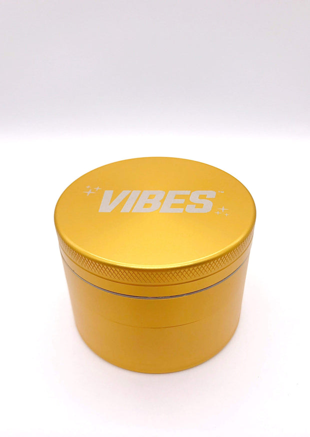 https://cdn.shopify.com/s/files/1/0298/6020/0586/products/vibes-4-piece-grinder-63mm-gold-63mm-sku-709-a1-17339769782426_620x.jpg?v=1593556748