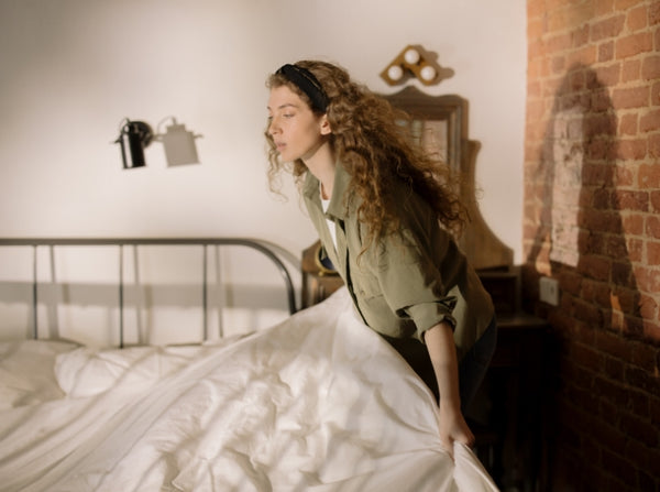 A woman keeping her bedroom cool