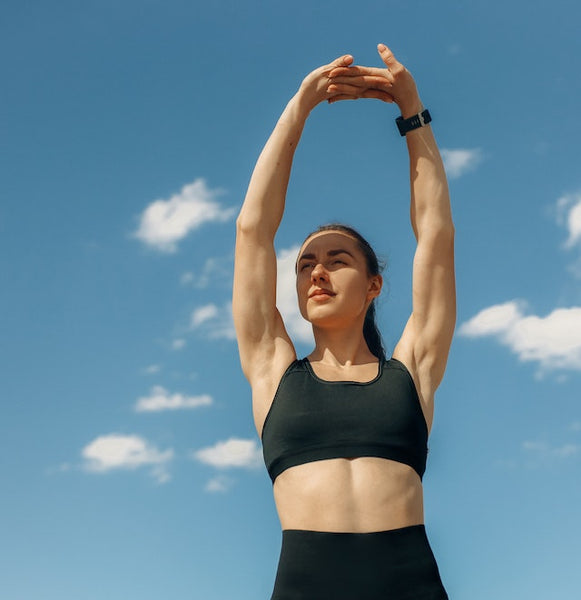 A woman exercising during the day