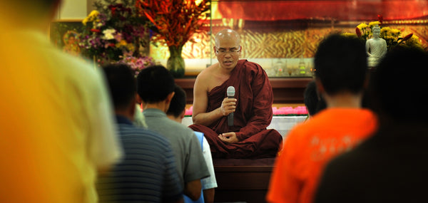 Prayer session held by Theravada Buddhist monks.
