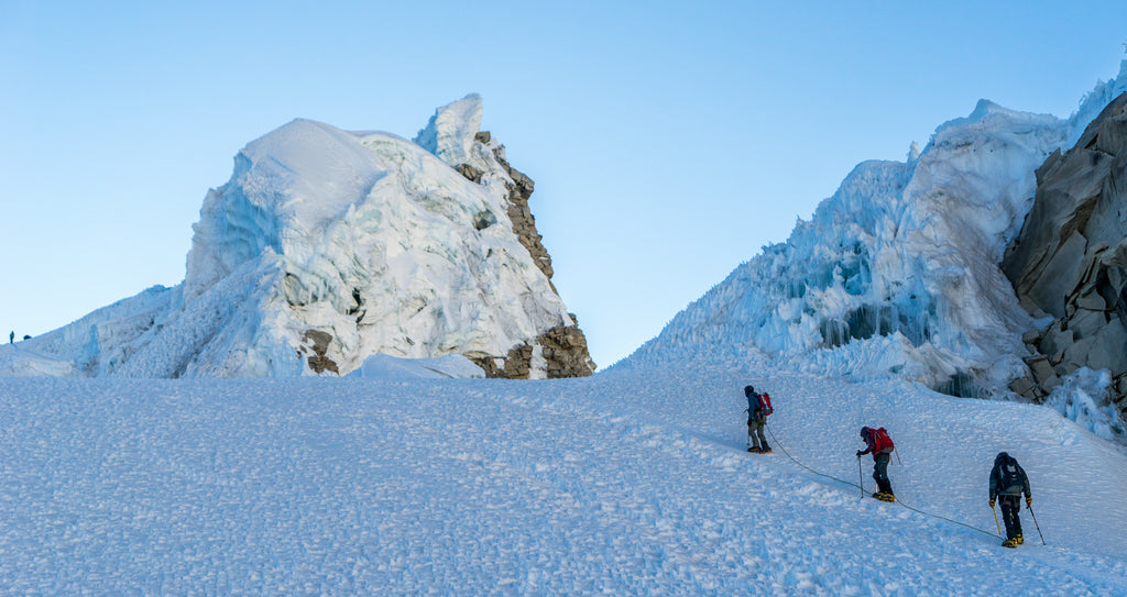 Climber's tackling Pisco Oeste using the Rest Step in Peru's Cordillera Blanca range.