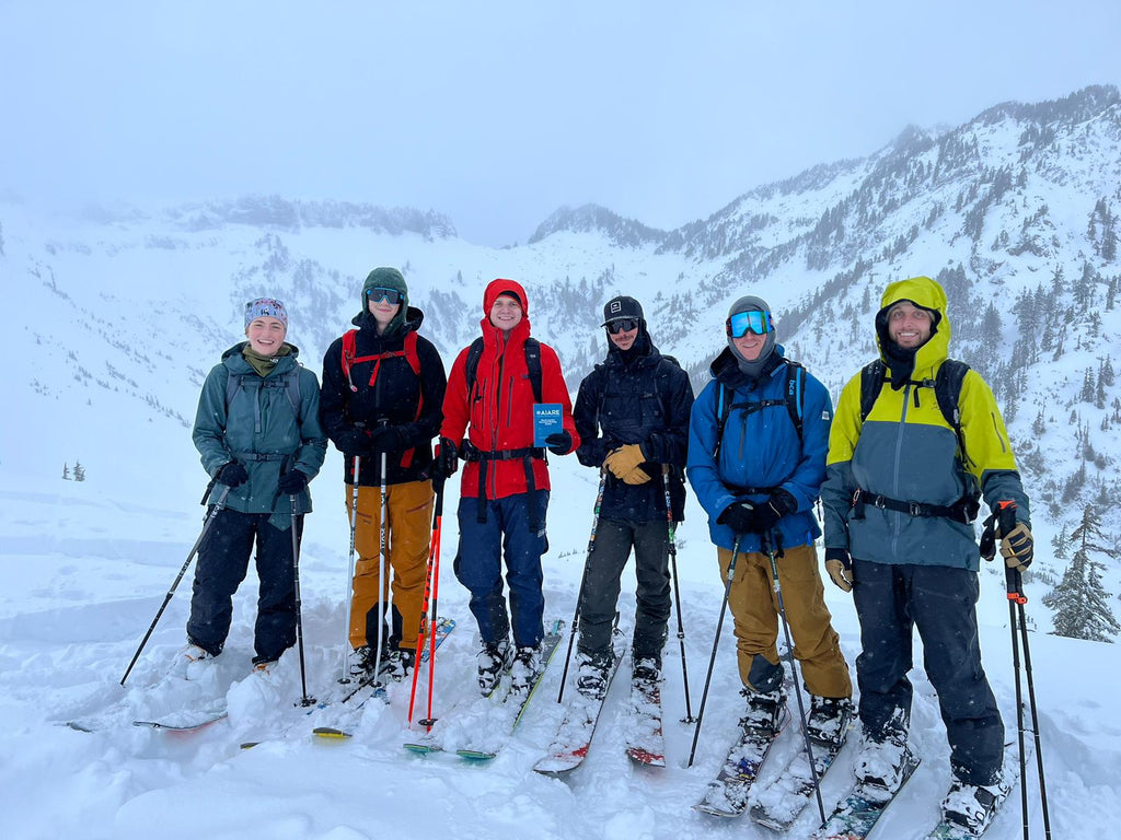 A group of skiers and riders during an AIARE 1 avalanche course in the Mt Baker backcountry