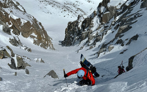 Couloir snowboarding skiing in the backcountry skier snowboarder mountaineering Eastern Sierra