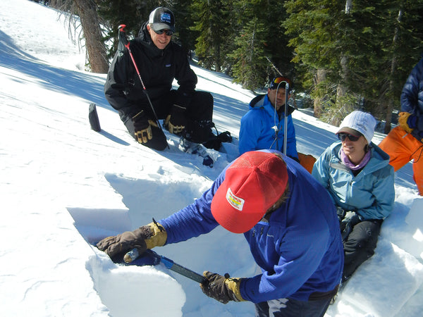 Students practicing snowpack tests during an AIARE 1