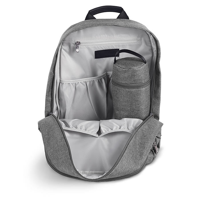 Backpack interior opened showing the bottle case and storage pockets