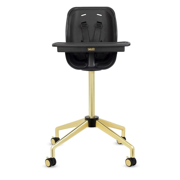 Melo Revel High Chair in black and brushed brass at Pish Posh Baby