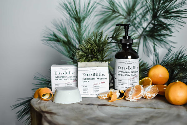 etta and billie evergreen tangerine products with tangerine peels and fir needles