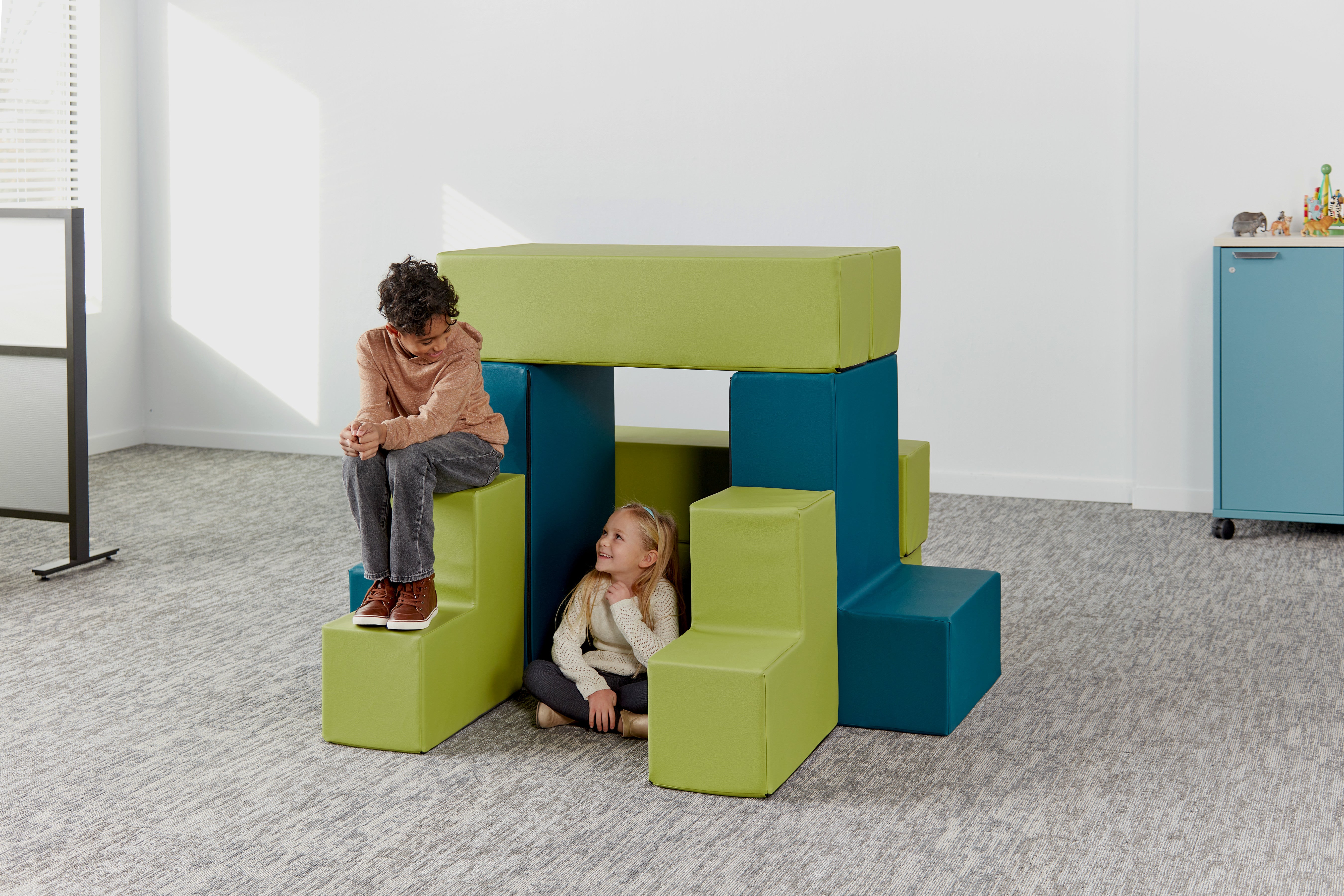 Kids interacting with the classroom furniture