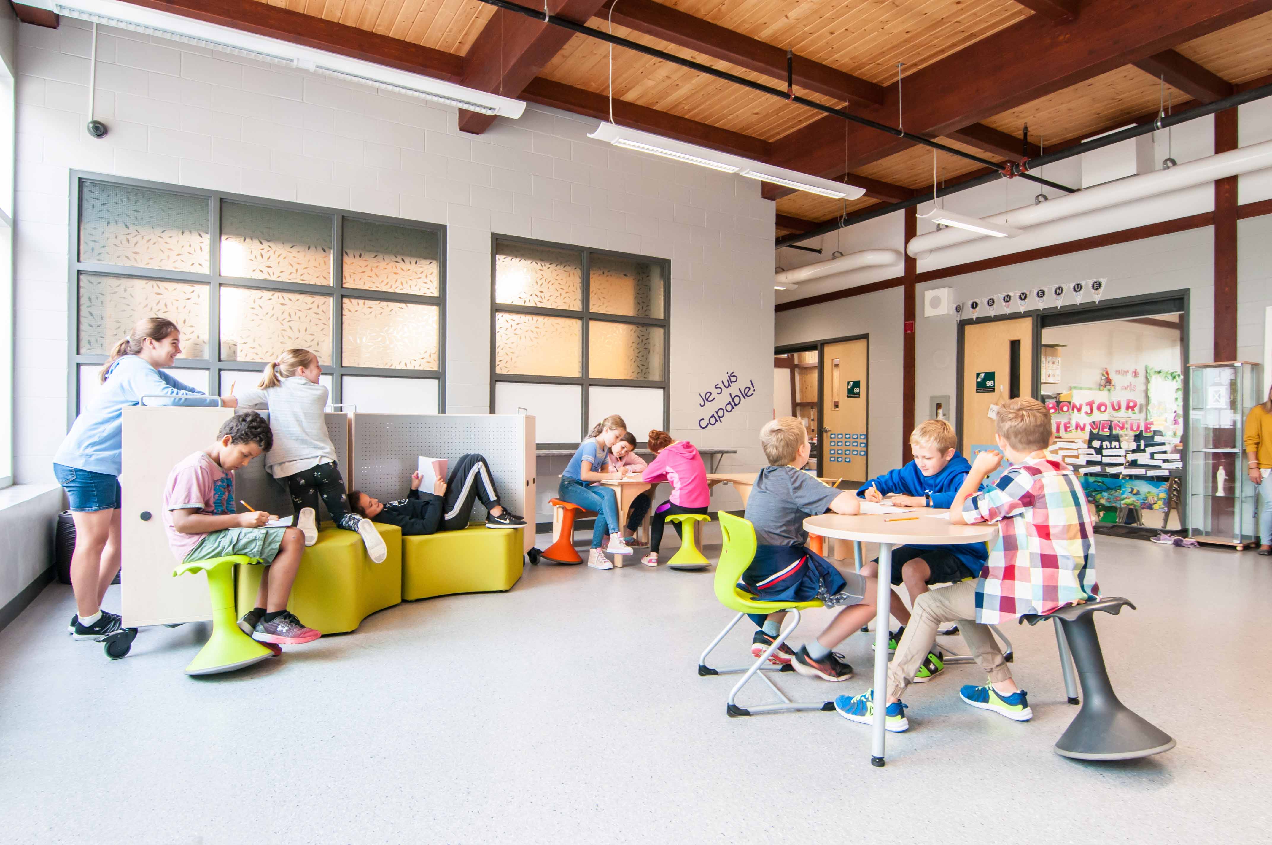 Students Studying and using the classroom to make themselves comfortable