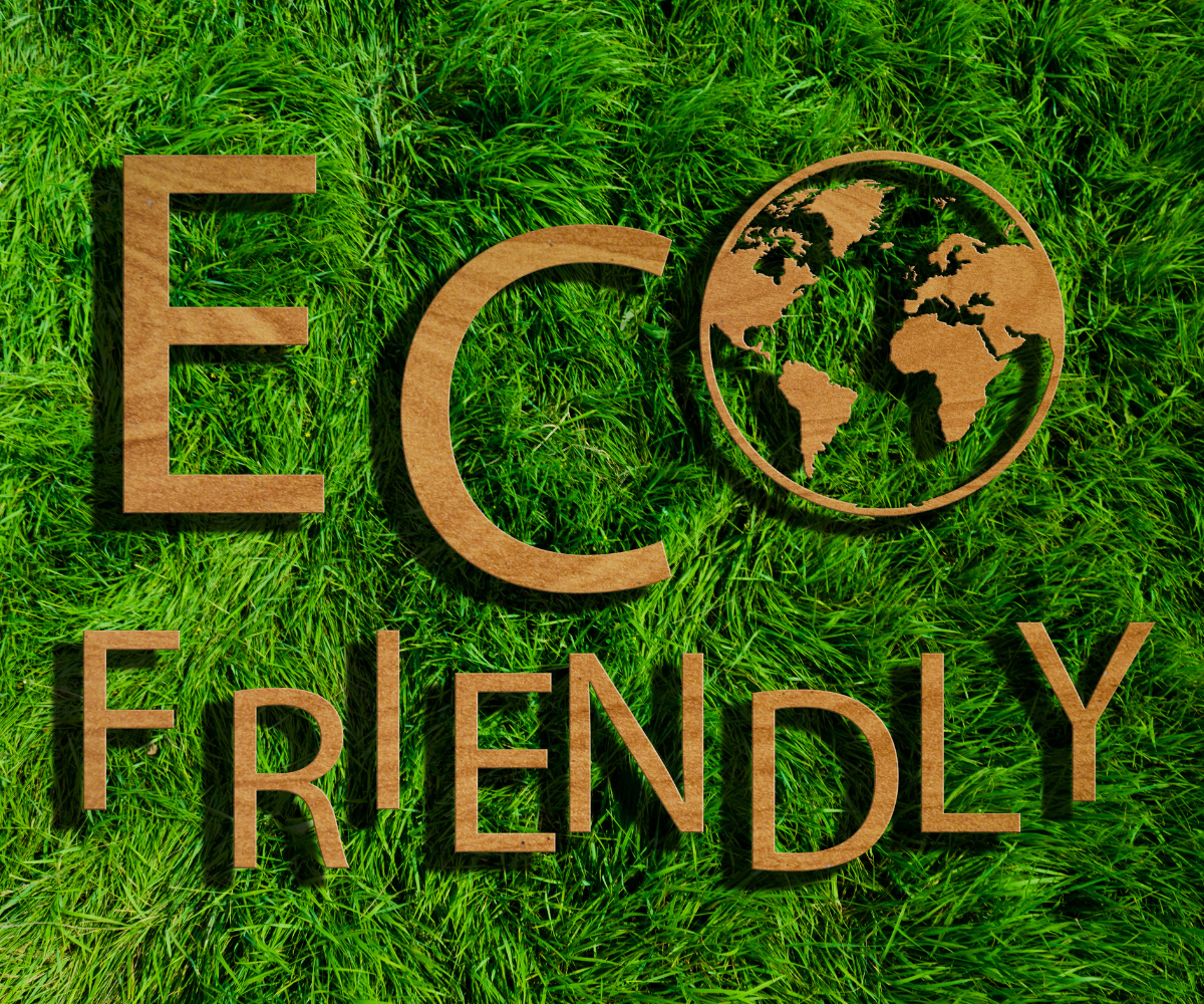 Eco Friendly written over top of Grass