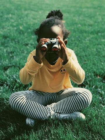 Girl with binoculars