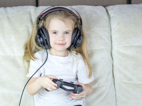 Little girl video gamer