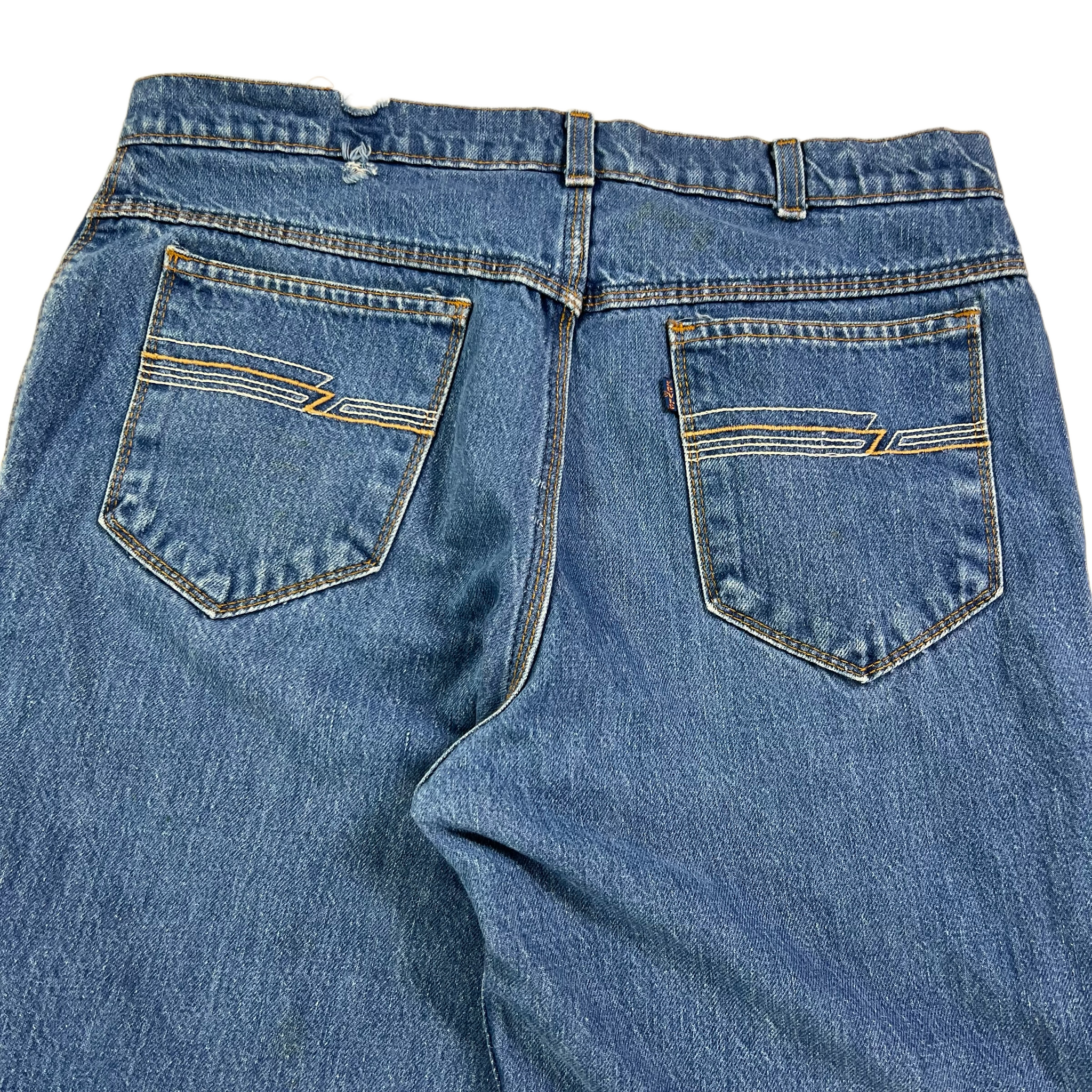 Vintage 80s Levi's Movin' On navy tab arcuate distressed denim jeans ( –  The Retro Recovery