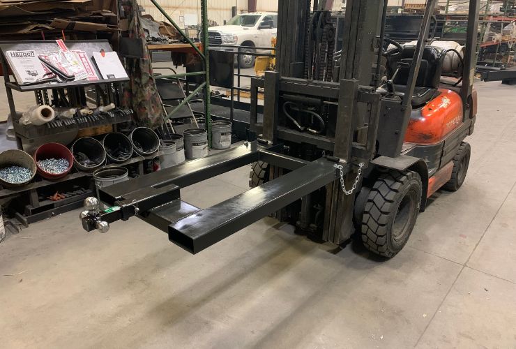 fork mounted trailer attachment for a forklift