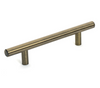 Up close picture of Diversa bar pull in the antique brass finish. 