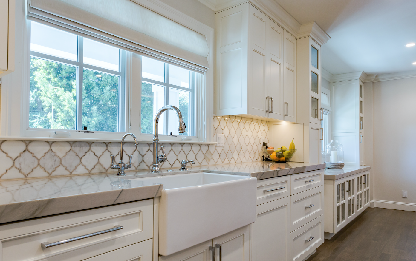 White kitchen with Chrome bar pulls