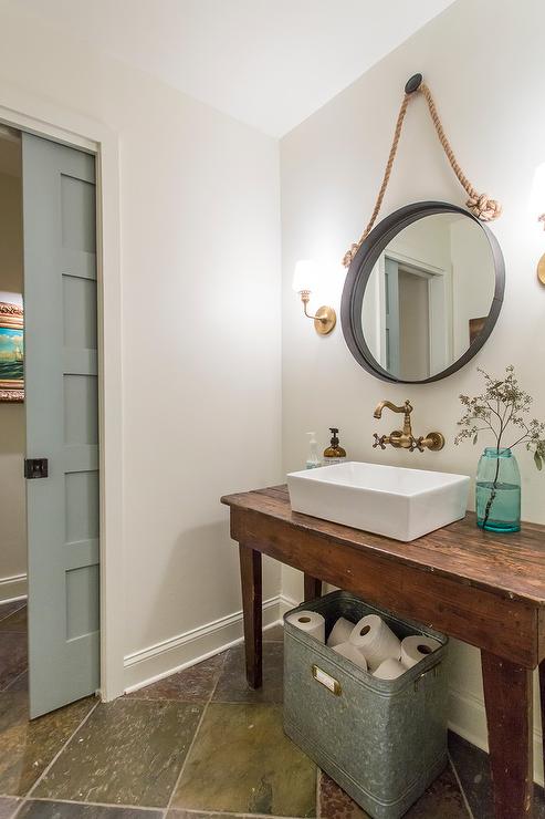 Bathroom with a pocket door and a square black pocket door latch for privacy