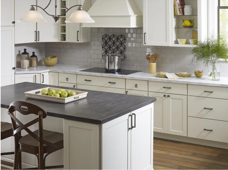 Graphite cabinet pulls on creamy white cabinets in country farmhouse kitchen