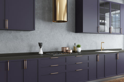 brushed brass on modern colored kitchen cabinets