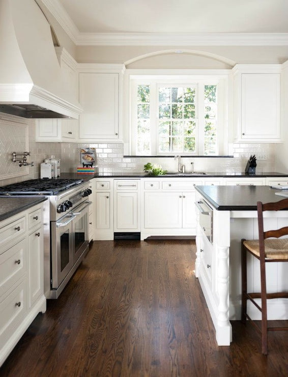 False drawers in a kitchen with cabinet knobs 