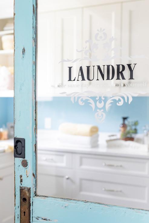 Use a half door to allow more light into a dark laundry room