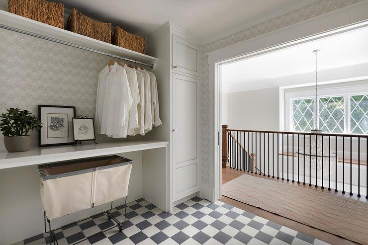 Laundry room with racks and shelves