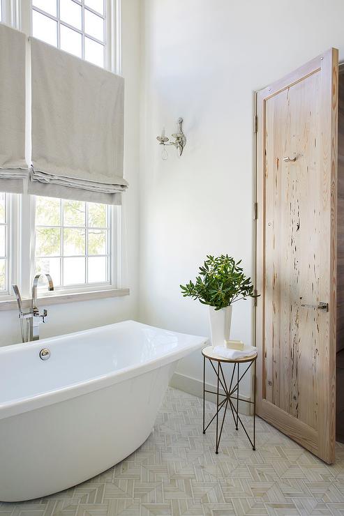 Privacy door knob on a wood bathroom door