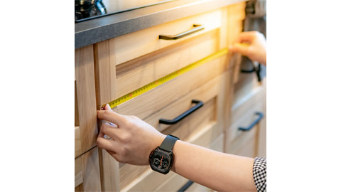 The 1/3 guideline means that the pull's overall length is approximately 1/3 of the length of the cabinet drawer.