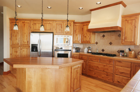 Doorcorner presents a large wood warm kitchen with modern appliances