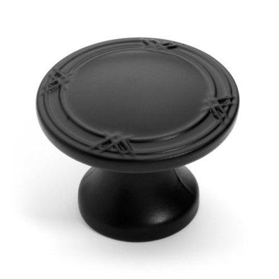 Round flat furniture knob with one and three eighths inch diameter in flat black finish