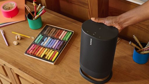 Sonos Move next to crayons on desk