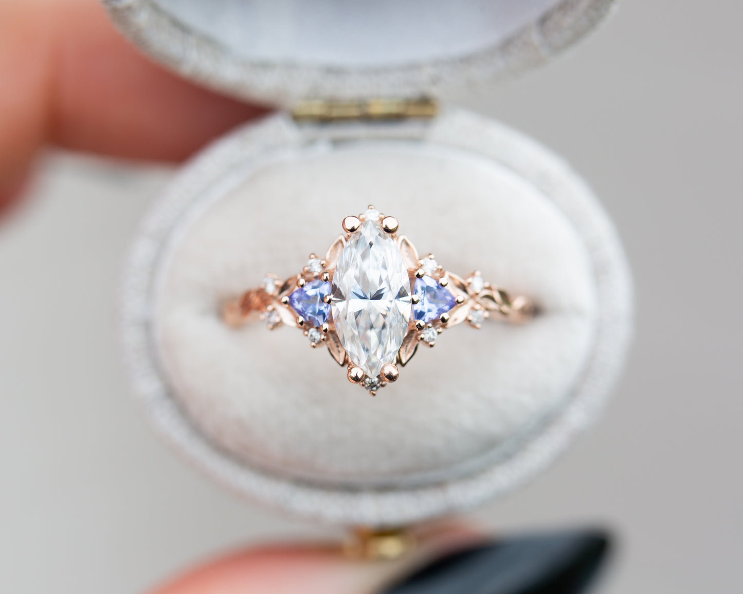 Briar rose three stone with marquise moissanite and tanzanite